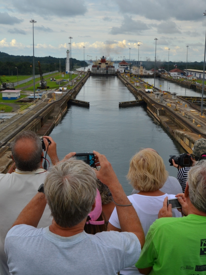 A second grade reading worksheet featuring a story about a girl fishing with her grandpa on a boat