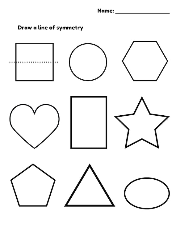 Learning Symmetry: Owl Drawing Grid Worksheet for Grade 2 Geometry A second grade student completing a symmetry worksheet by drawing an owl using a grid to practice geometry skills