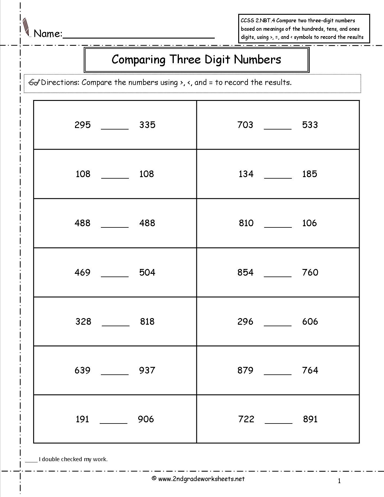 Comparing Three Digit Numbers Check-in Worksheet 16 Second grade students completing a math worksheet comparing three digit numbers for assessment 16