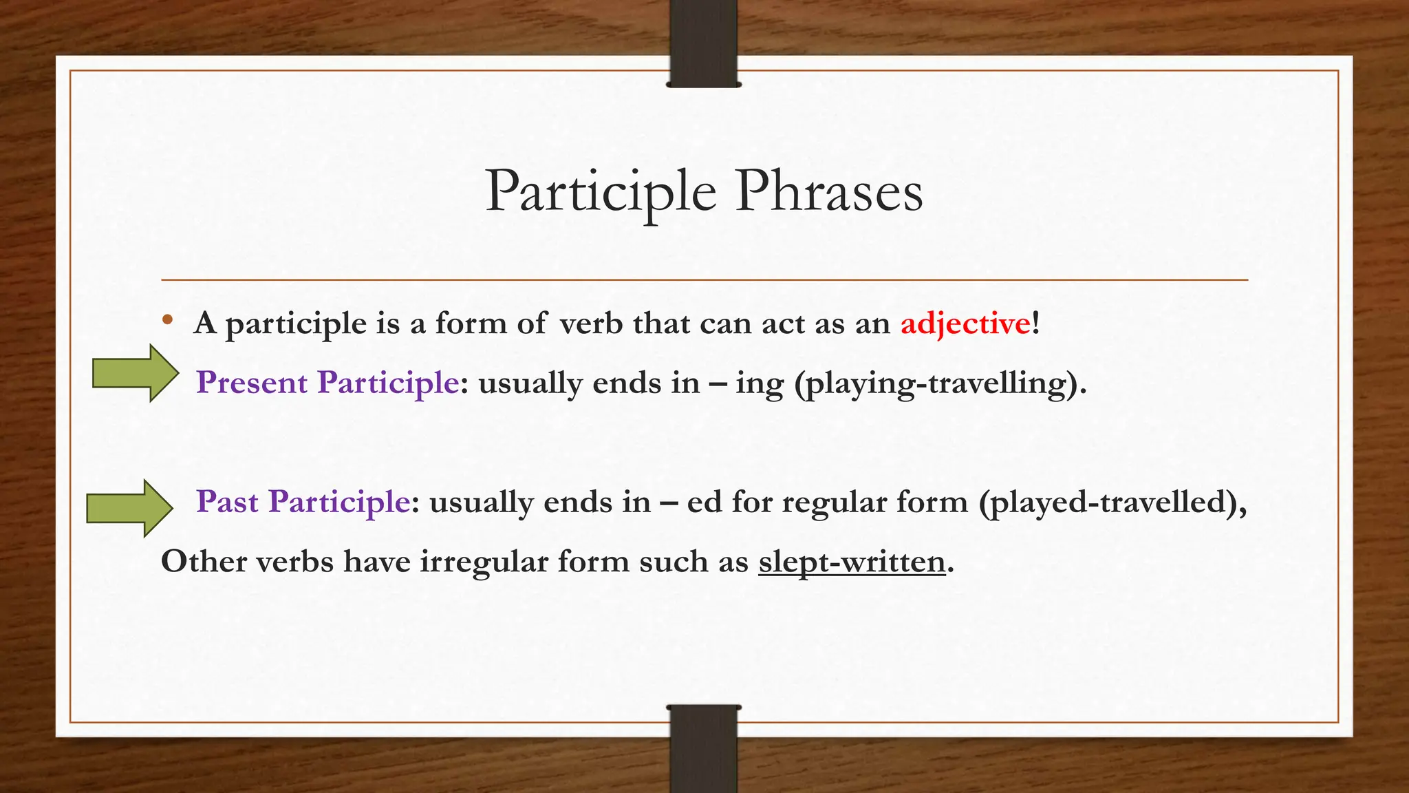 Students completing grammar exercises identifying gerund infinitive and participial phrases on a seventh grade worksheet