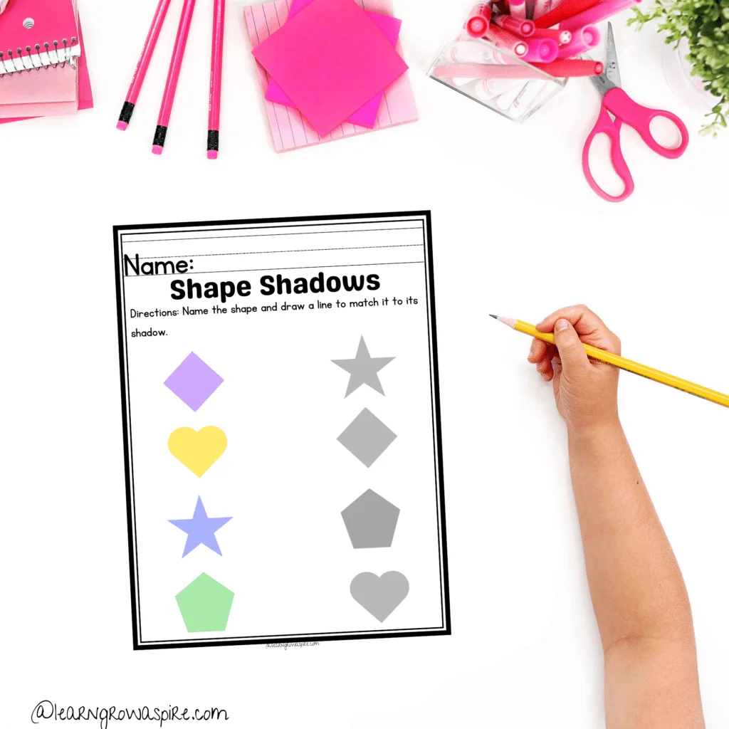 Fifth grade student practicing shading techniques on a drawing light and shadow worksheet