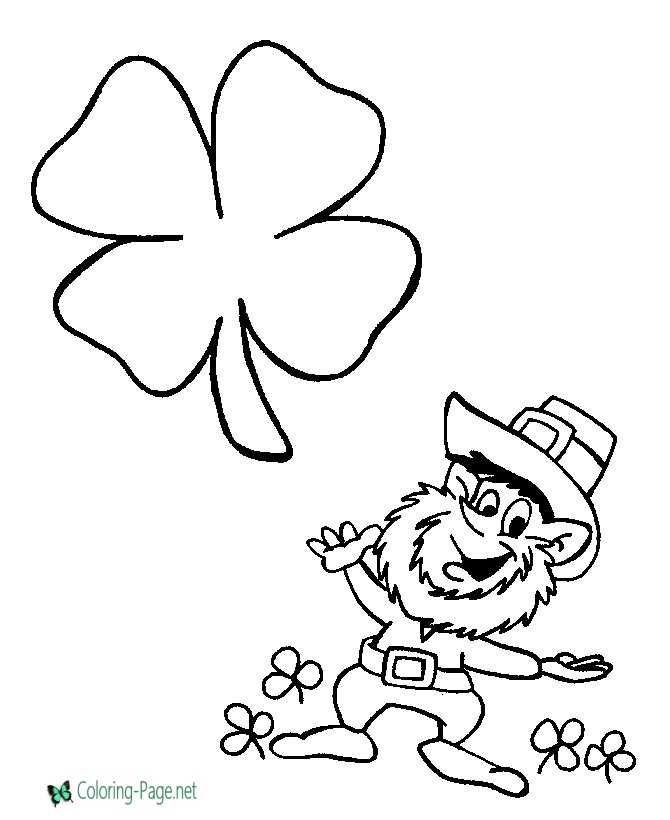 A child's hand coloring a large shamrock shape with green markers on a festive St. Patrick's Day worksheet