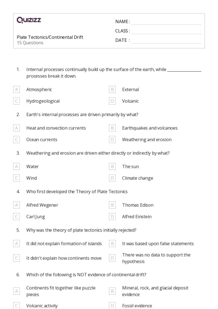 Sixth grade students studying geological layers and ancient remains on an Analyzing the Fossil Record worksheet