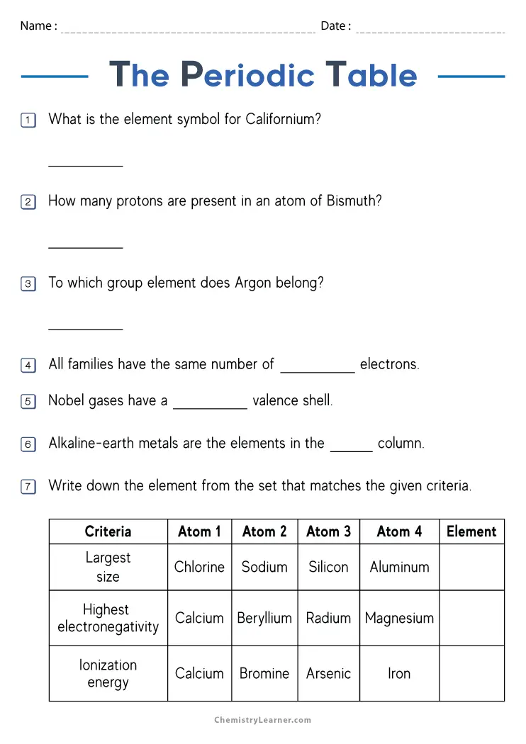 Sixth grade student studying a colorful periodic table of elements worksheet with organized rows and columns