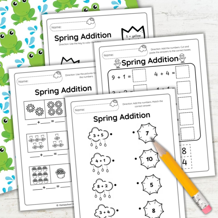 First grade student completing a spring themed one-digit addition worksheet with 20 math problems