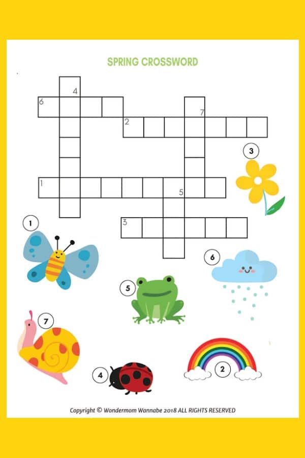 Second grade students solving a spring-themed crossword puzzle to practice vocabulary and spelling skills