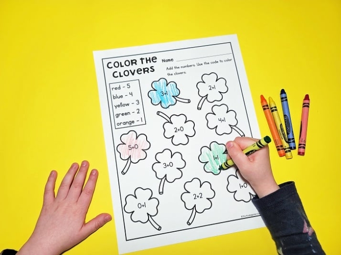 Word Families worksheet for Kindergarten Colorful St. Patrick's Day Picture Addition worksheet featuring rainbows, shamrocks, and sheep for kindergarteners. Engaging math activity for young learners celebrating St. Patrick's Day.