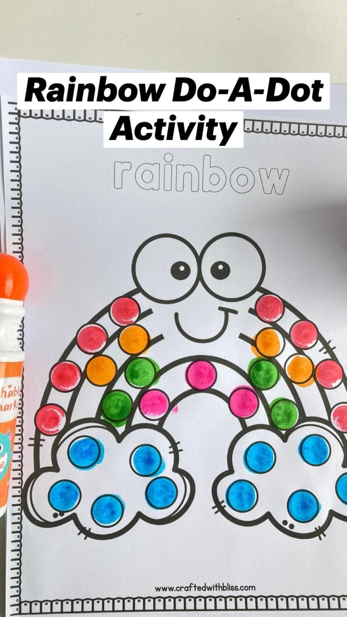 First grade student connecting the dots on a St. Patrick's Day rainbow and pot of gold math worksheet