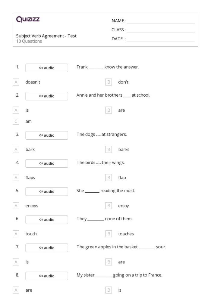Third grade students practicing subject-verb agreement by selecting matching verbs for sentence subjects