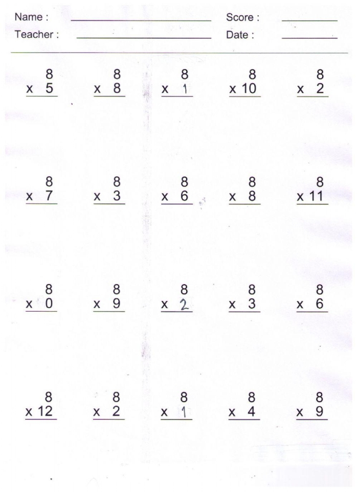 Third grade students working on a multiplying by eight math worksheet