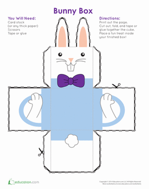 Third grade student using a printed worksheet to build a colorful Easter egg holder for math class