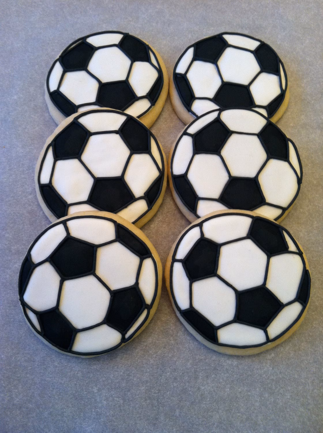Explore the fun of measuring football cookies with this engaging worksheet for division skills Football Cookie Measurement worksheet for third graders measuring cookie sizes
