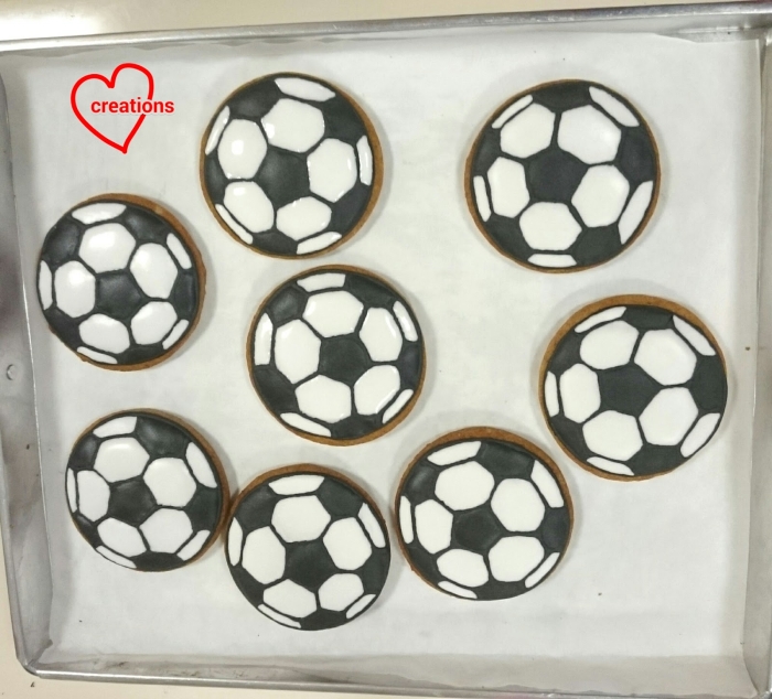 Illustration of a fun football-themed measurement activity for students Football Cookie Measurement worksheet for third graders measuring cookie sizes