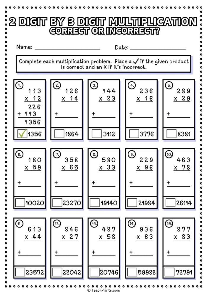 Third grade student working on a multiplying by two math worksheet with a multiplication table