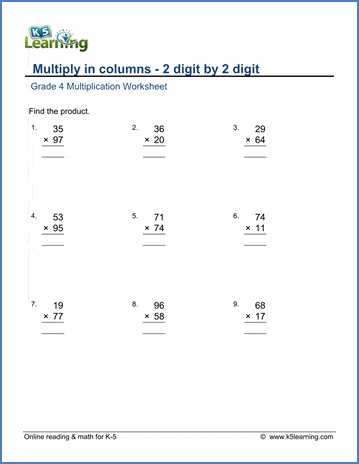 Third grade student using a pencil to solve multiplying by two math equations on a worksheet