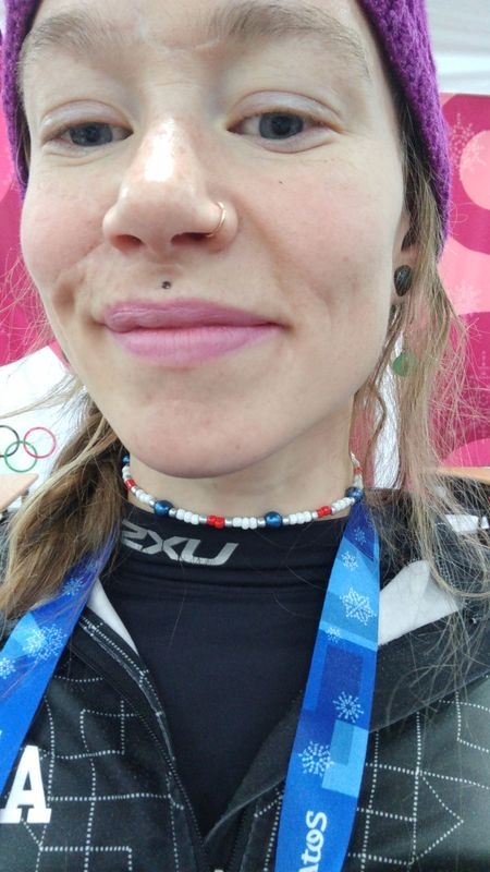 Pre-K worksheet showing Olympic snowboarder Chloe Kim with space to trace her name and color the image