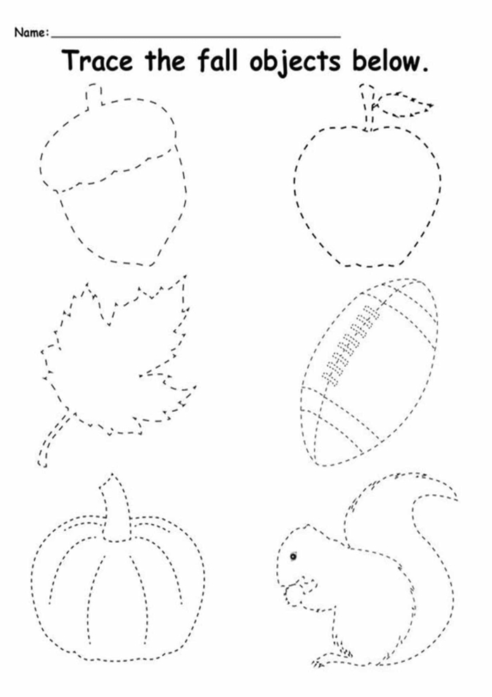 Children tracing lines from colorful leaves to the ground in a Fall-themed worksheet