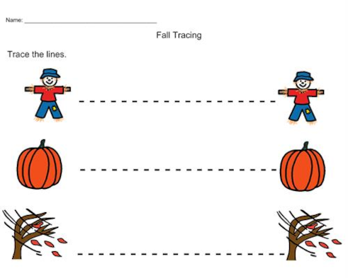 Children tracing lines from leaves to the ground on a fall-themed worksheet