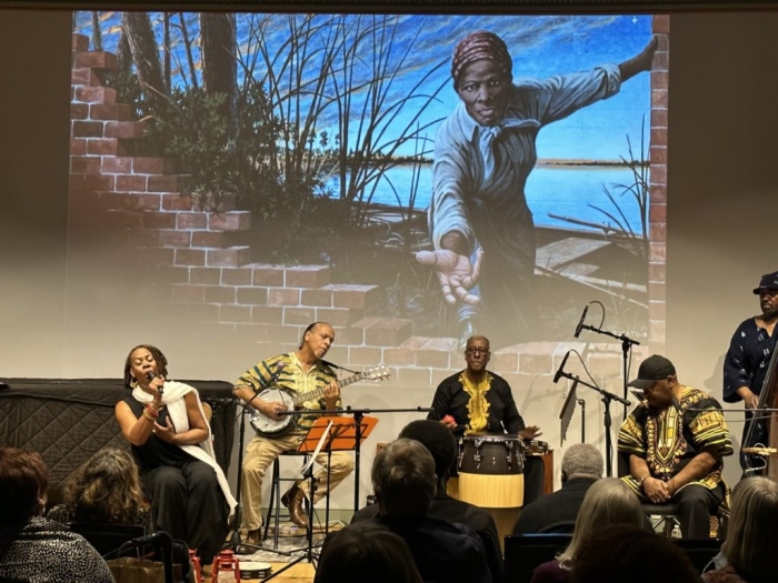 Children engaging with the Underground Railroad: Songs of Freedom worksheet in a classroom setting