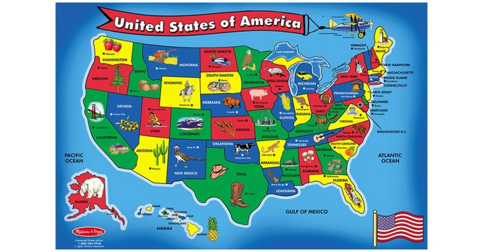 First grade student assembling a United States puzzle worksheet featuring all 50 states