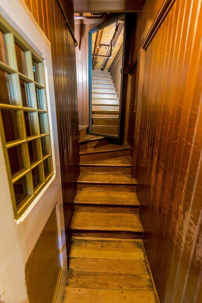 Winchester Mystery House history and counting worksheet for grade five students Fifth grade math worksheet featuring a historical passage and counting questions about the Winchester Mystery House