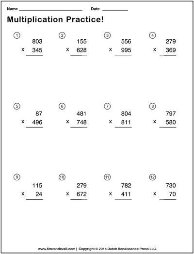 Fifth grade students solving winter-themed three-digit multiplication problems on a practice worksheet