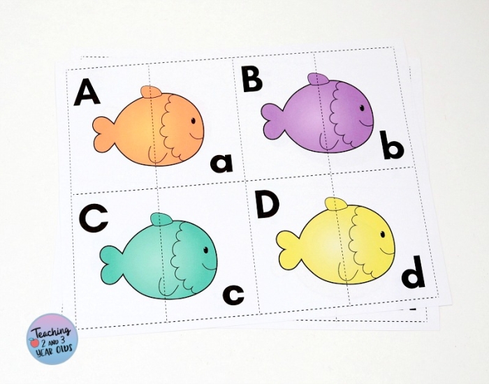 Finish the Fish Alphabet activity for young learners on time and money concepts, worksheet number 8 Kindergarten worksheet featuring ocean-themed fish with missing lowercase letters to complete the alphabet