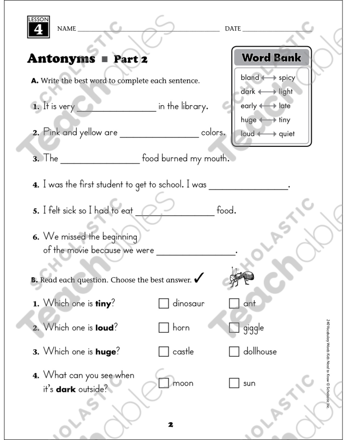 First grade children completing an antonyms matching worksheet to enhance vocabulary