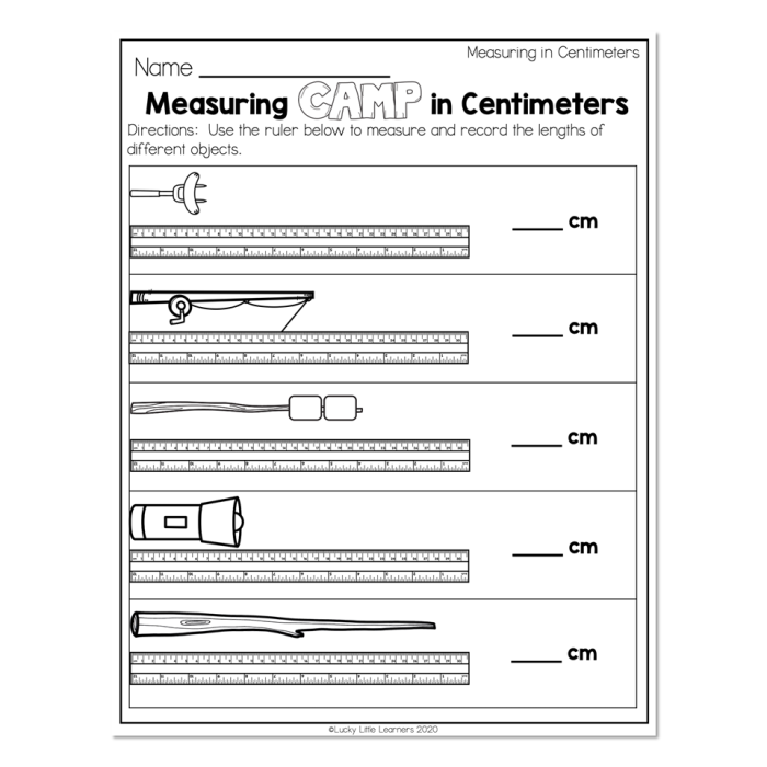 First grader measuring a sneaker with a ruler on a centimeters worksheet