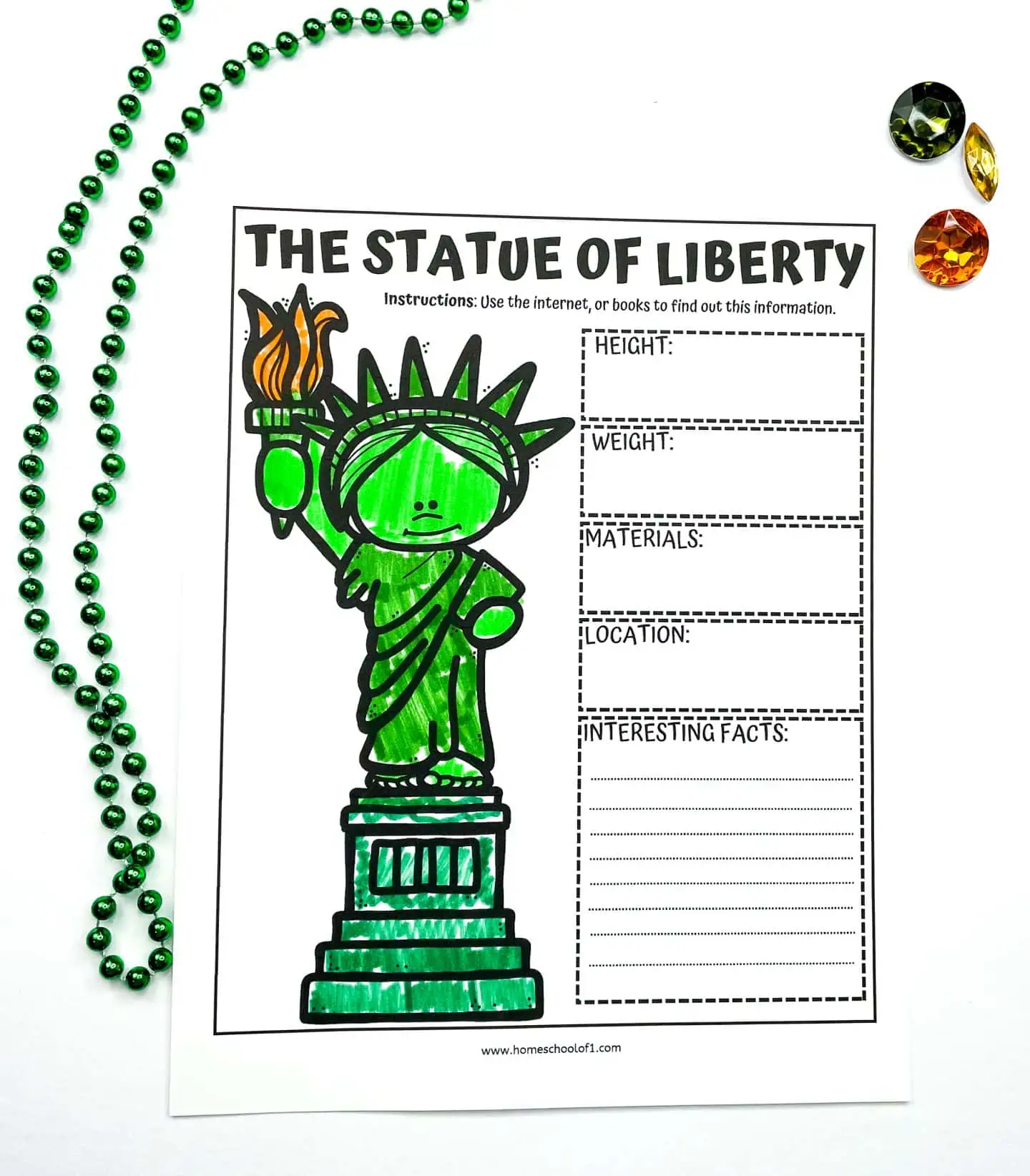 Second grade child coloring a Statue of Liberty worksheet while learning about national symbols