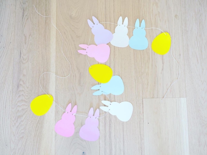 Second Grade Easter Garland worksheet featuring colorful numbers and counting activities