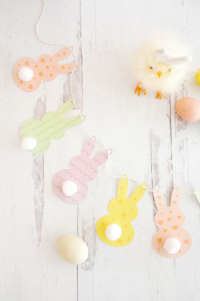 Easter Garland worksheet featuring colorful bunny and egg cutouts for counting practice