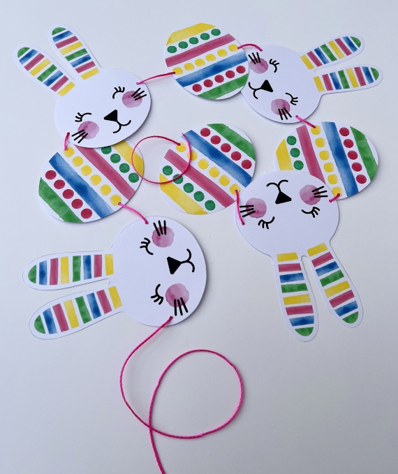 Second Grade Easter Garland worksheet with numbers and counting activities
