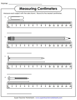 First grader measuring a sneaker length in centimeters on a worksheet