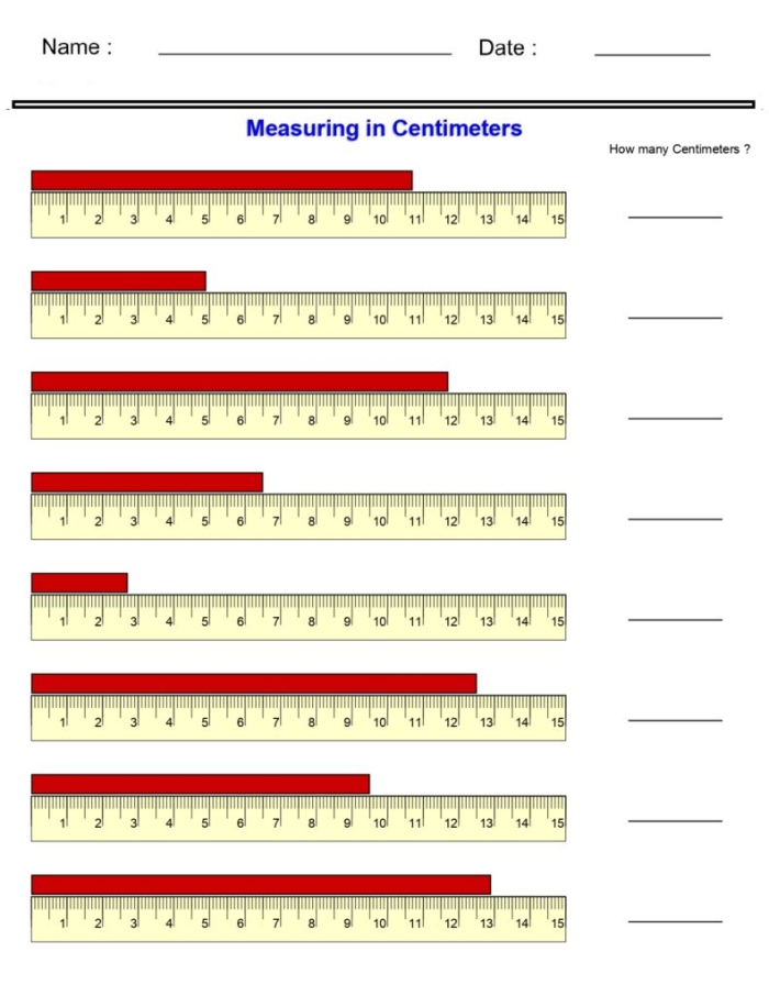 First grader measuring a sneaker using a ruler in centimeters on a worksheet