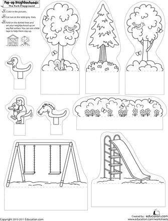 First-grade worksheet featuring a pop-up playground with swing set, slide, and children for creative play