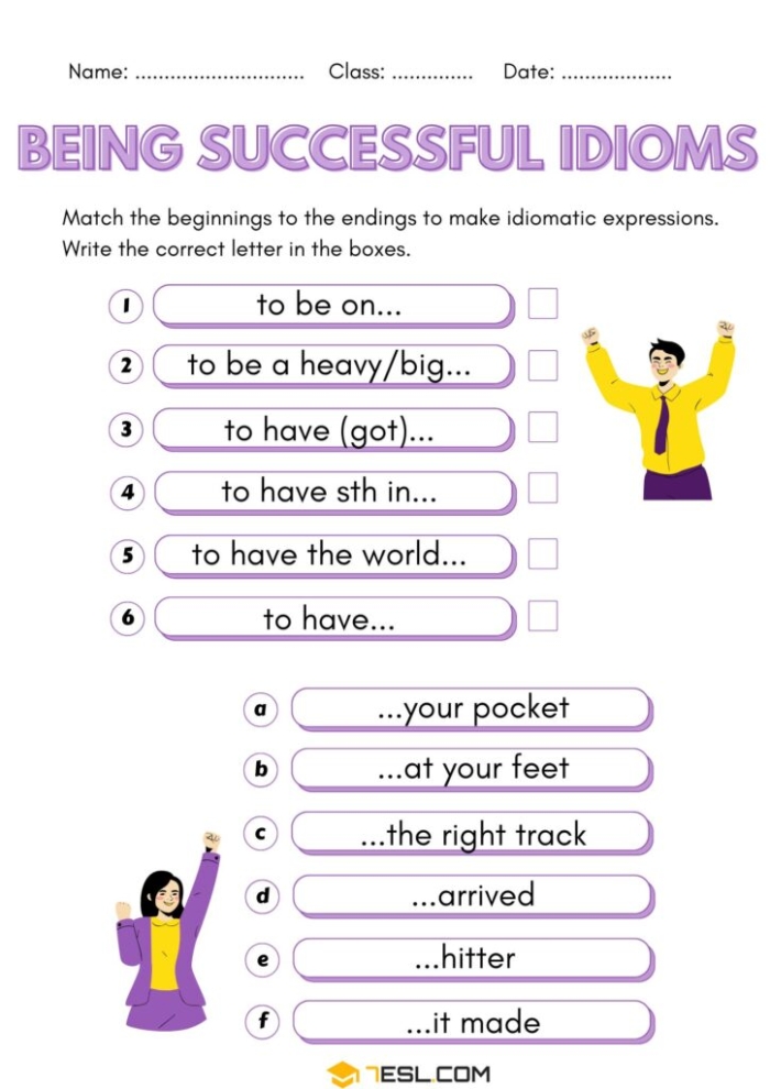 Second grade students completing a Mixed-Up Idioms worksheet by writing idiom meanings and drawing illustrations