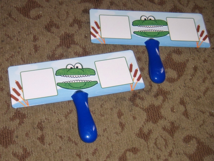 Kindergarten worksheet showing Greater Gator 2 with numbers and comparison symbols