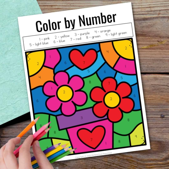 Kindergarten worksheet for recognizing numbers with a flower coloring activity Kindergarten Color by Number Flower worksheet featuring numerals and number words to color a flower