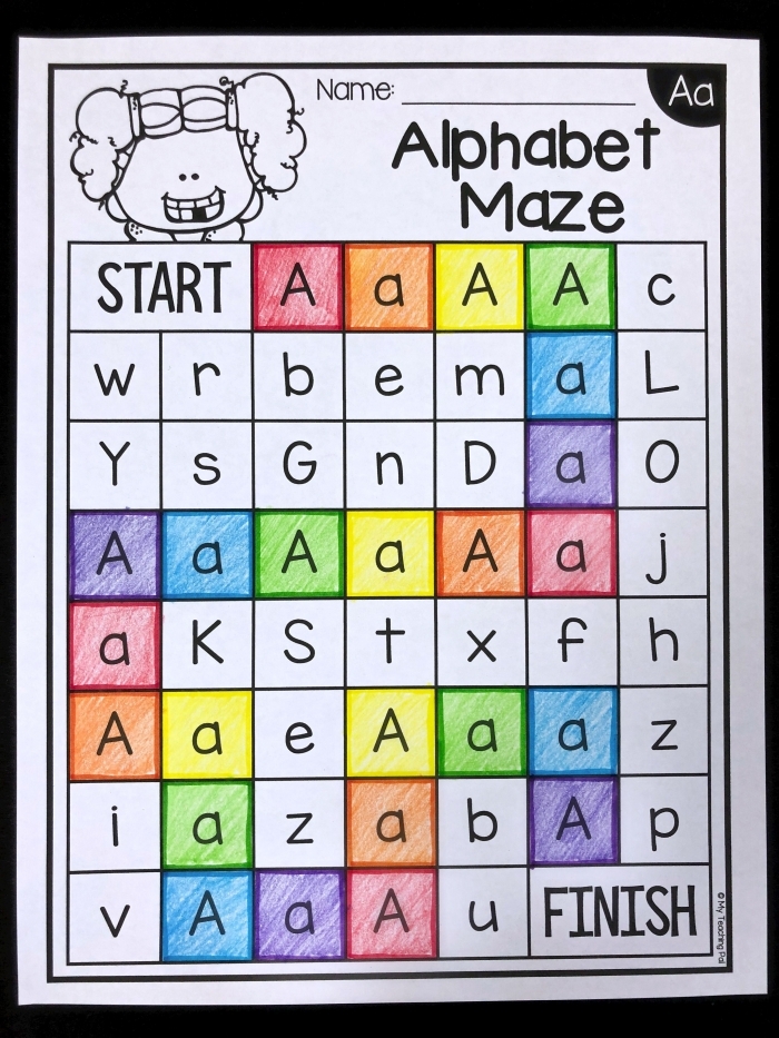 Finish the Fish Alphabet worksheet for time and money learning in kindergarten fun 11 Kindergarten worksheet featuring ocean fish with missing lowercase letters to complete the alphabet