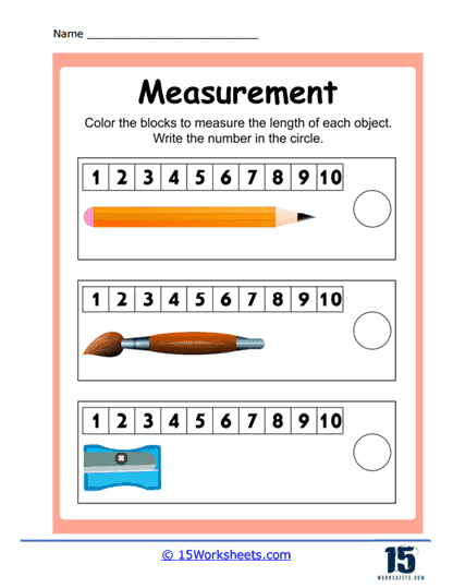 First Grade student using a Measure the Length worksheet to measure common household items