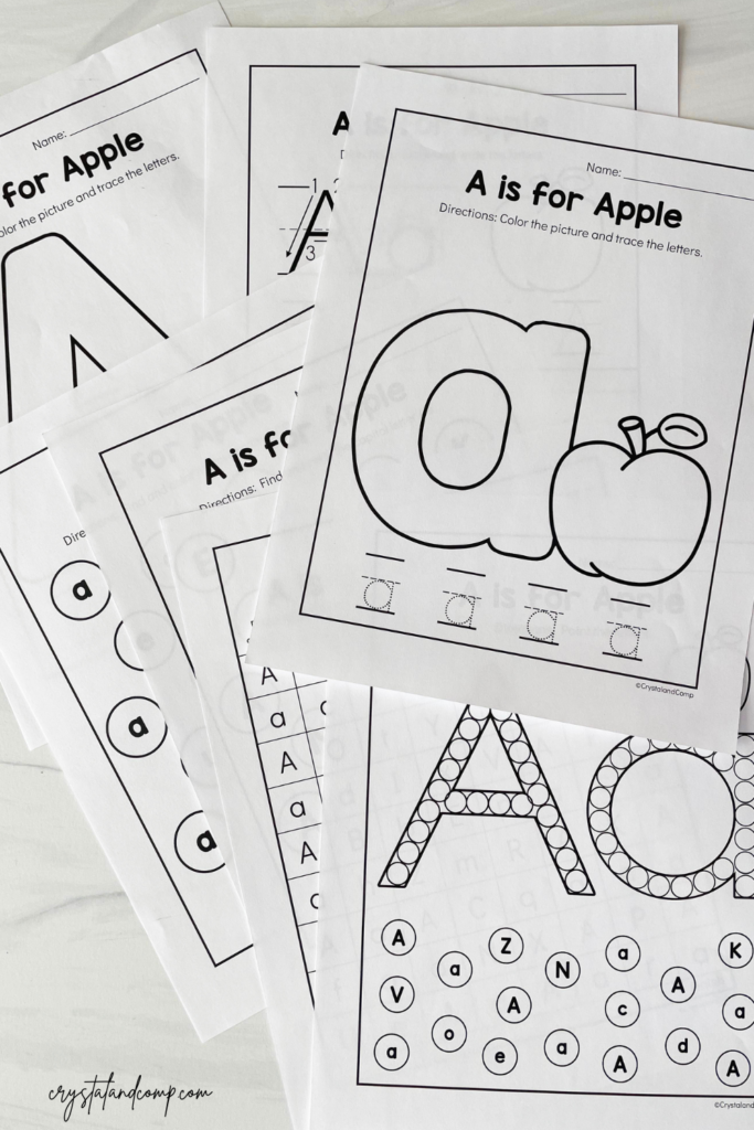 Pre-K letter A practice activity with apple coloring and handwriting exercises for fine motor skill development A is for Apple worksheet showing apples to color, letter A tracing lines, and writing practice for Pre-K students