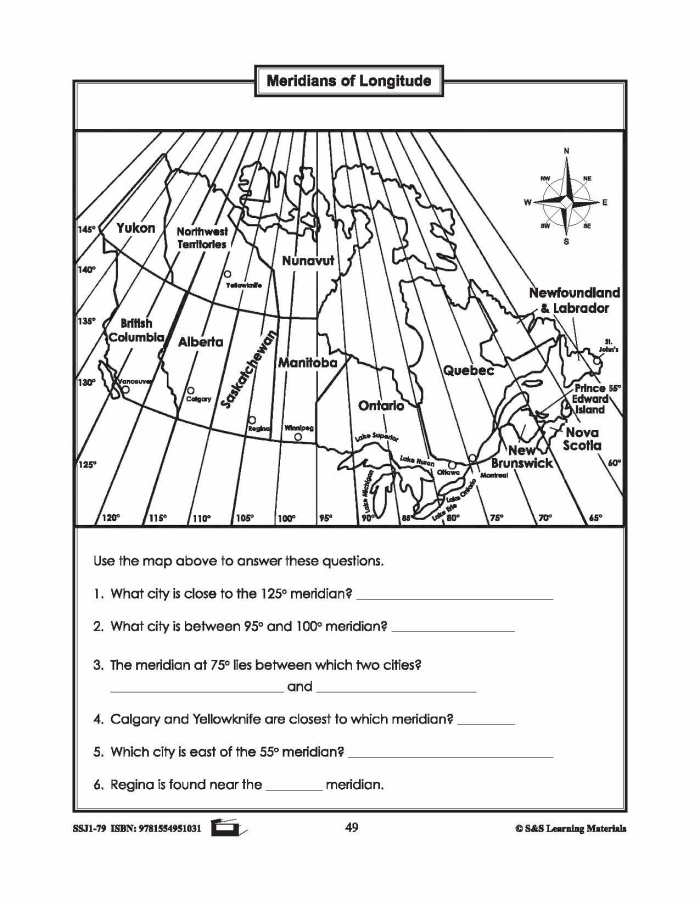 Second grade students using a longitude and latitude coordinates worksheet to locate cities on a map