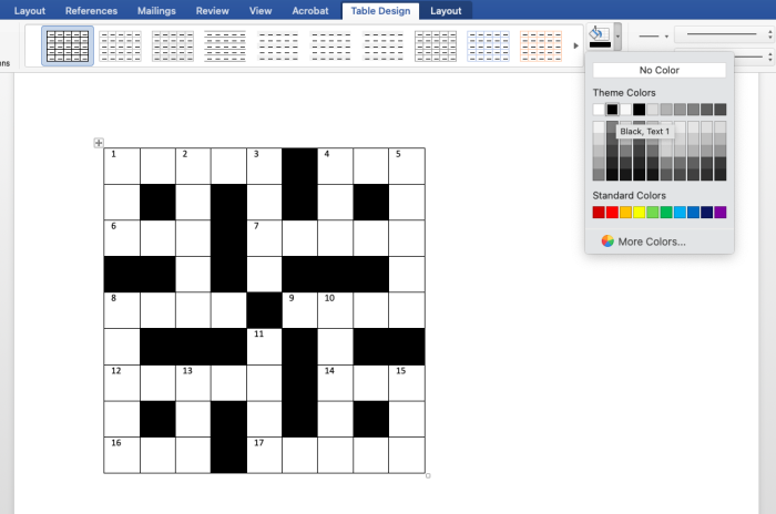 A fourth-grade student creating a multiplication crossword puzzle worksheet