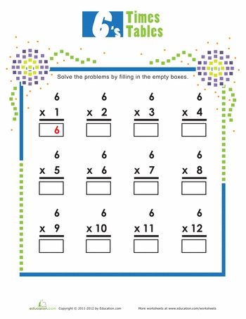Third grader completing a times tables worksheet focused on multiplying by six