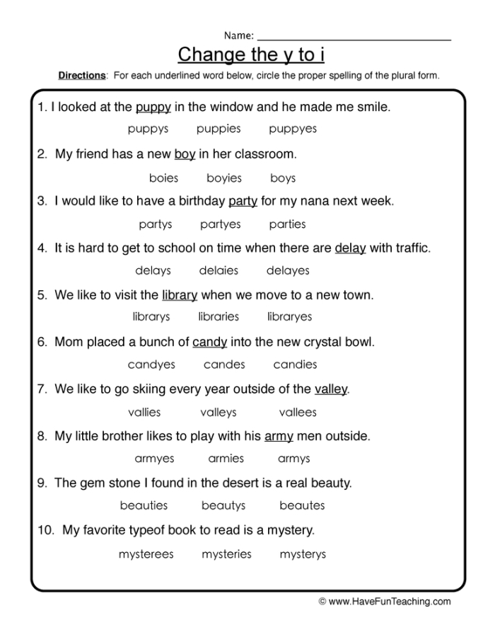 Practice worksheet for turning singular y-ending words into plurals in first grade grammar First Grade worksheet focusing on plural nouns ending in y with examples like candy and kitty
