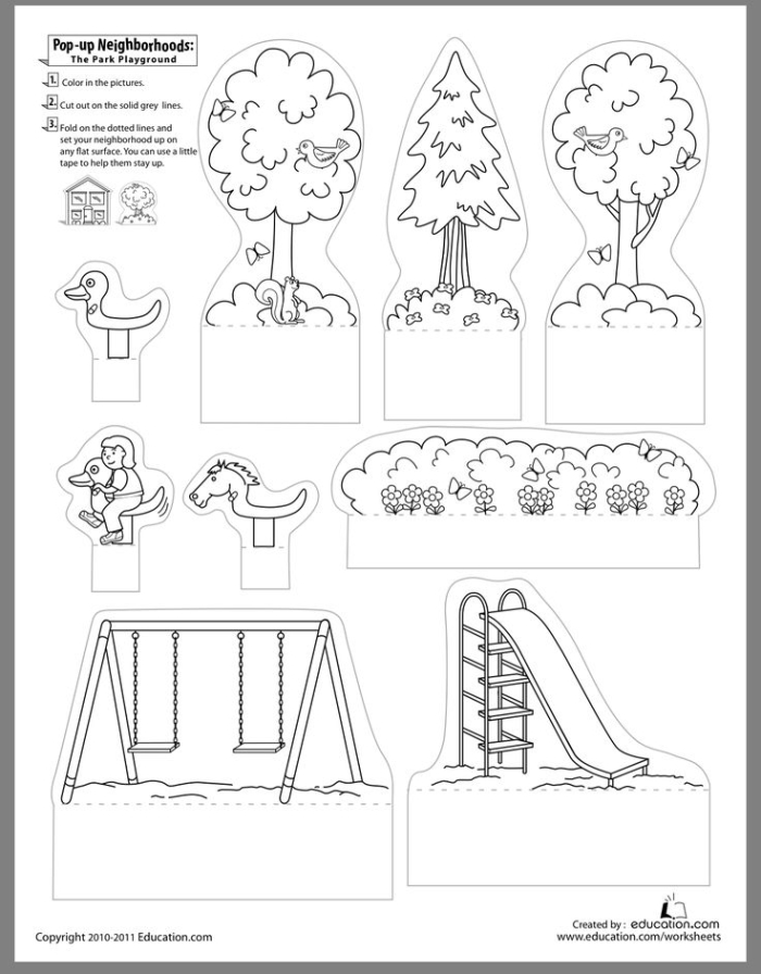 Colorful pop-up playground worksheet featuring swings, slides, and playful children for first graders