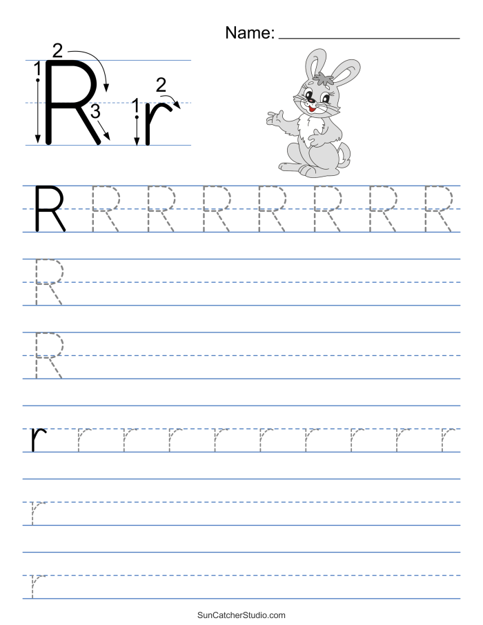 Pre-K children practicing fine motor skills by tracing lines and the letter R on an American Sign Language worksheet