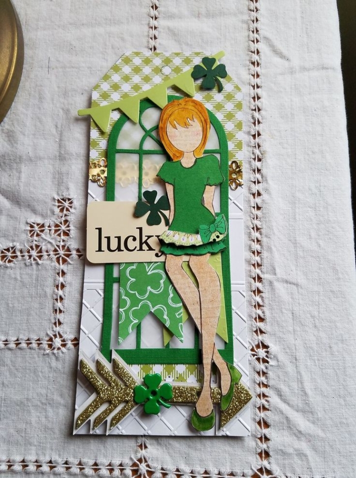 St. Patrick's Day paper doll girl worksheet for Pre-K focusing on clothing and holiday colors