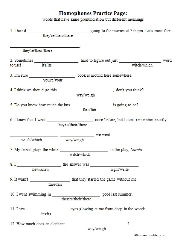 Second grade students filling out a worksheet on homophones they're and their in a life science class
